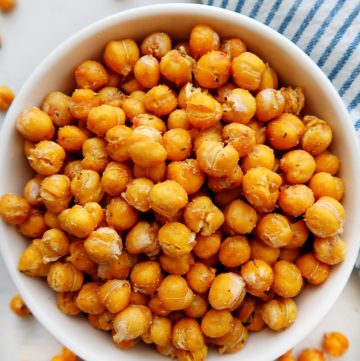 Roasted chickpeas in a white bowl.