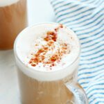 Chai lattes topped with coconut whipped cream.